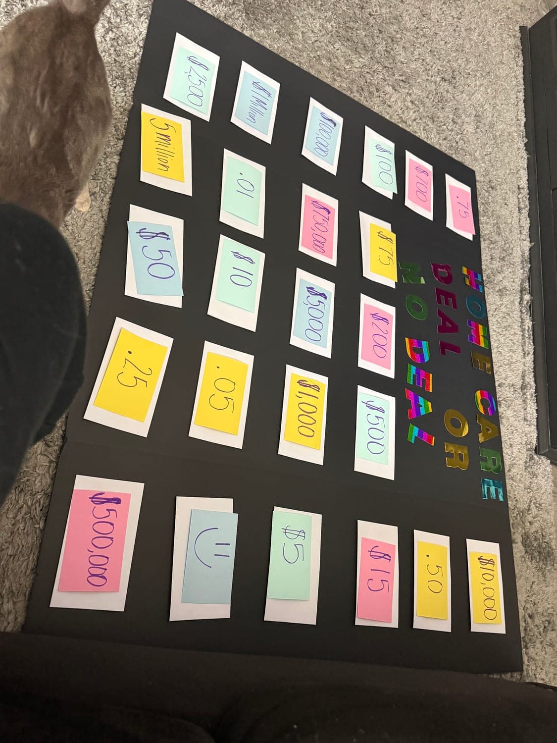 A hand-made Deal or No Deal game board with colourful prize cards, created by Healthcare Support Home Care as a senior activity for residents of Ridenour, a 55+ community in Cobb County